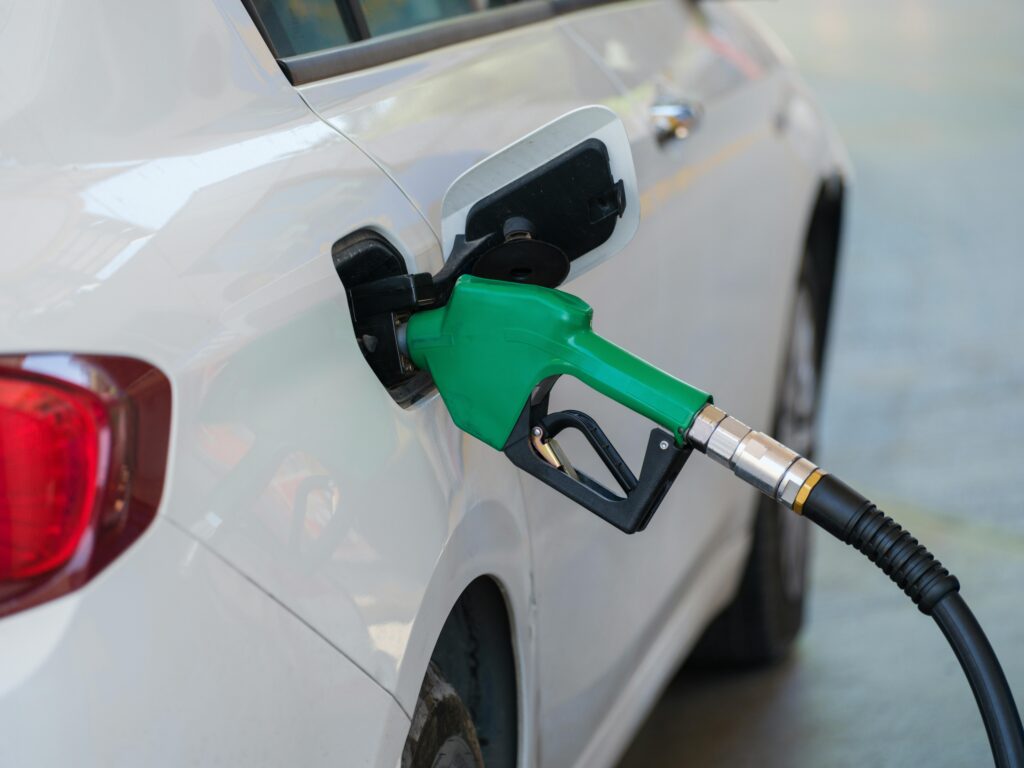 Luxury fleet vehicle refueling showing fuel expenses in limousine fleet management
