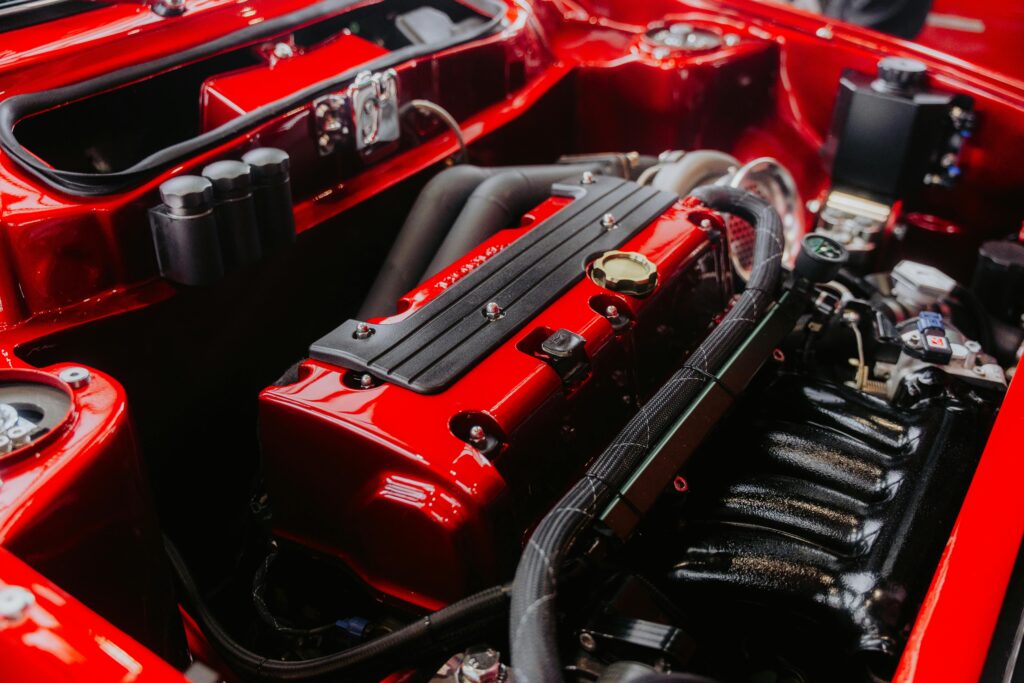 Close up of a luxury car engine bay undergoing a technical Dubai Fleet Health Checklist inspection